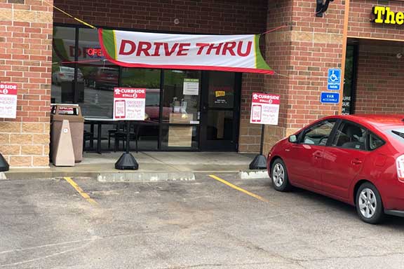 Car parked curbside of a Goodcents location