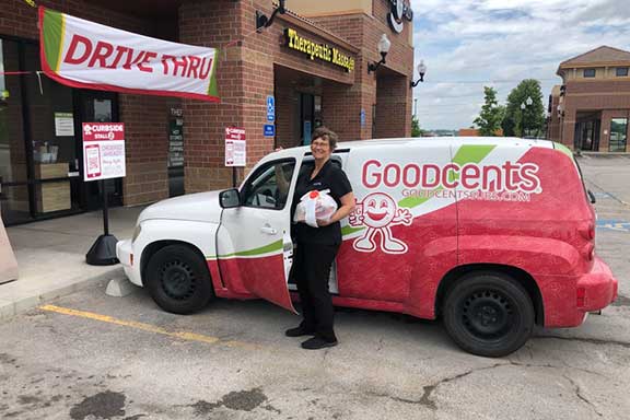 Driver getting into delivery van with Goodcents order