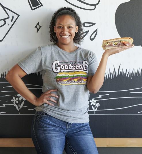 Person wearing Goodcents tshirt with a sub